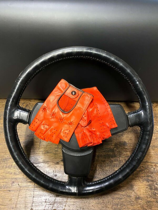 Orange driving gloves